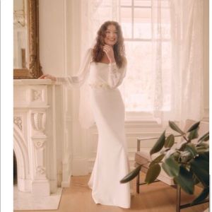 Wedding gown. White slight off white. New with tags. Unaltered